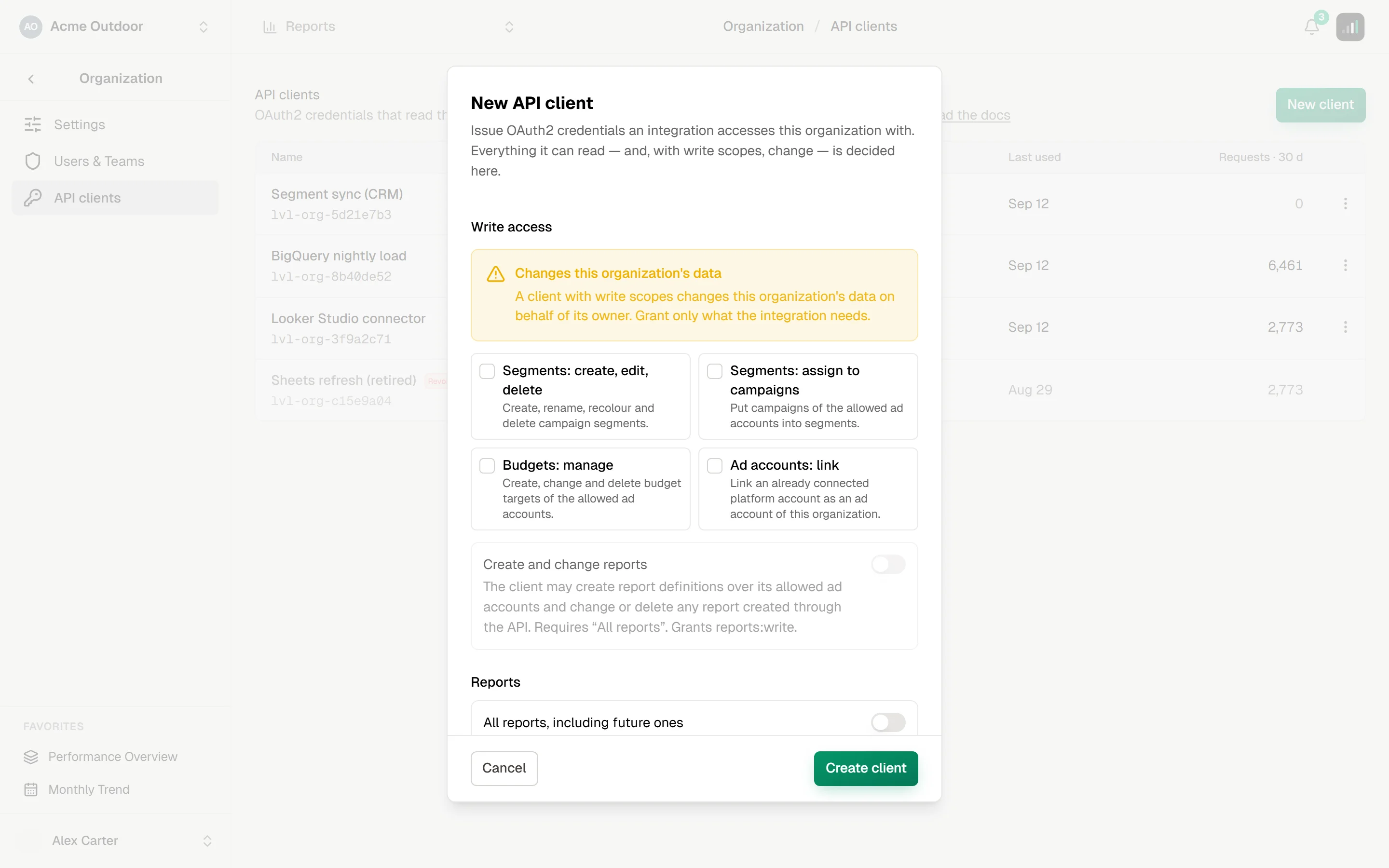 New API client dialog scrolled to the Write access group, with a warning that write scopes change the organization's data and checkboxes for segments, targets and ad accounts plus a switch for creating and changing reports