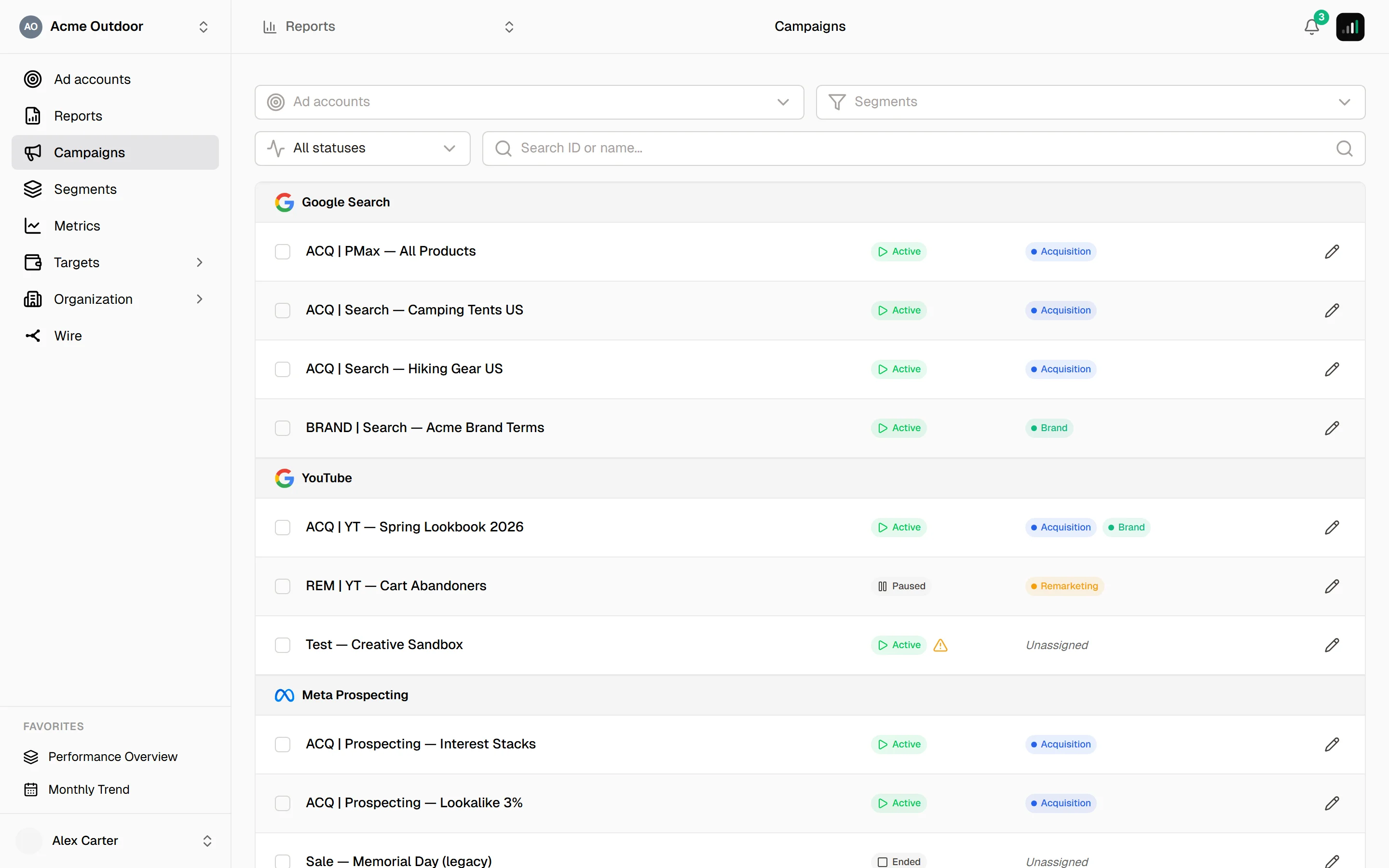 Campaigns list showing Active and Paused badges per campaign, with a warning triangle next to an active campaign that has not delivered
