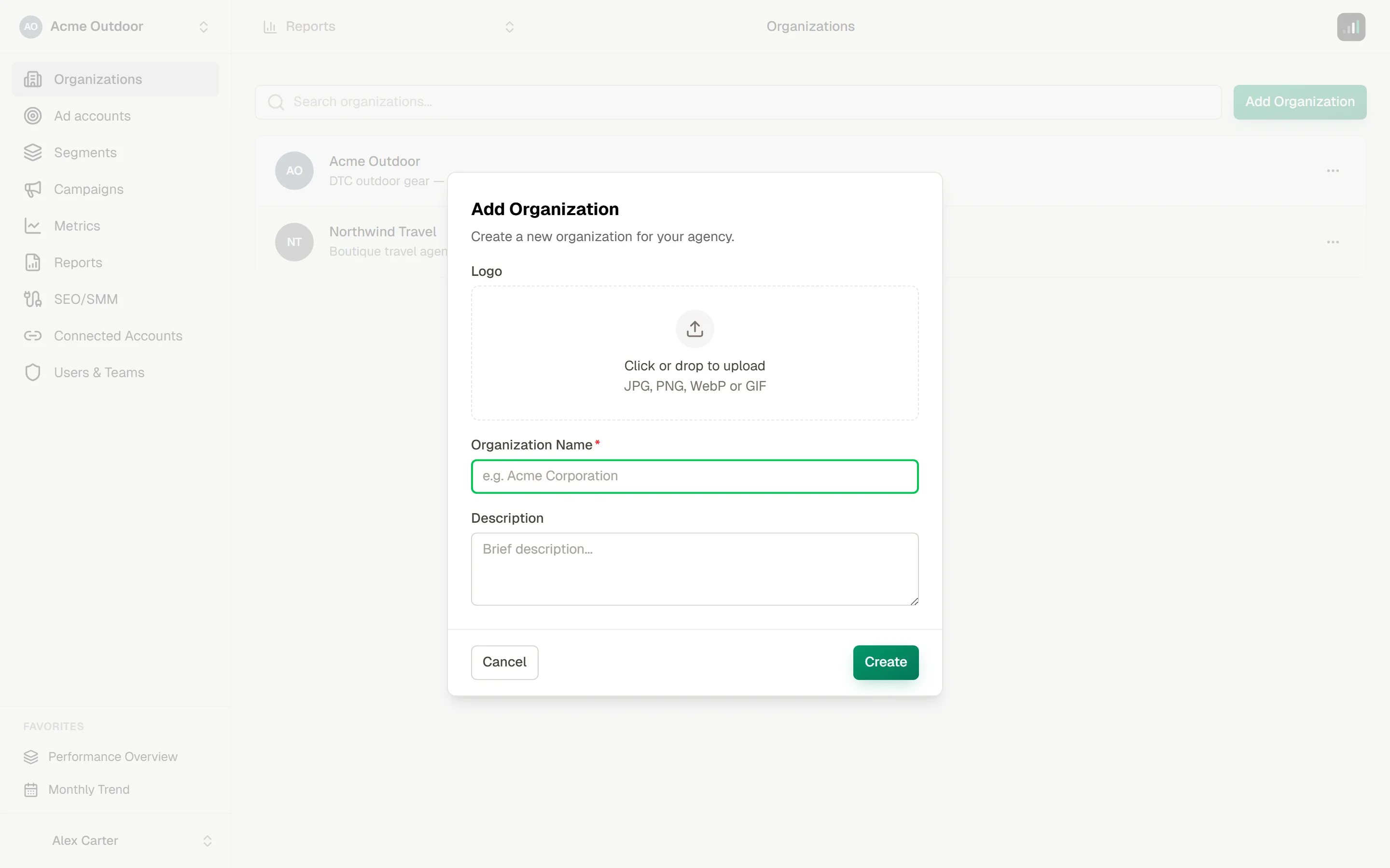 Organization modal in create mode with Logo, Name, and Description fields