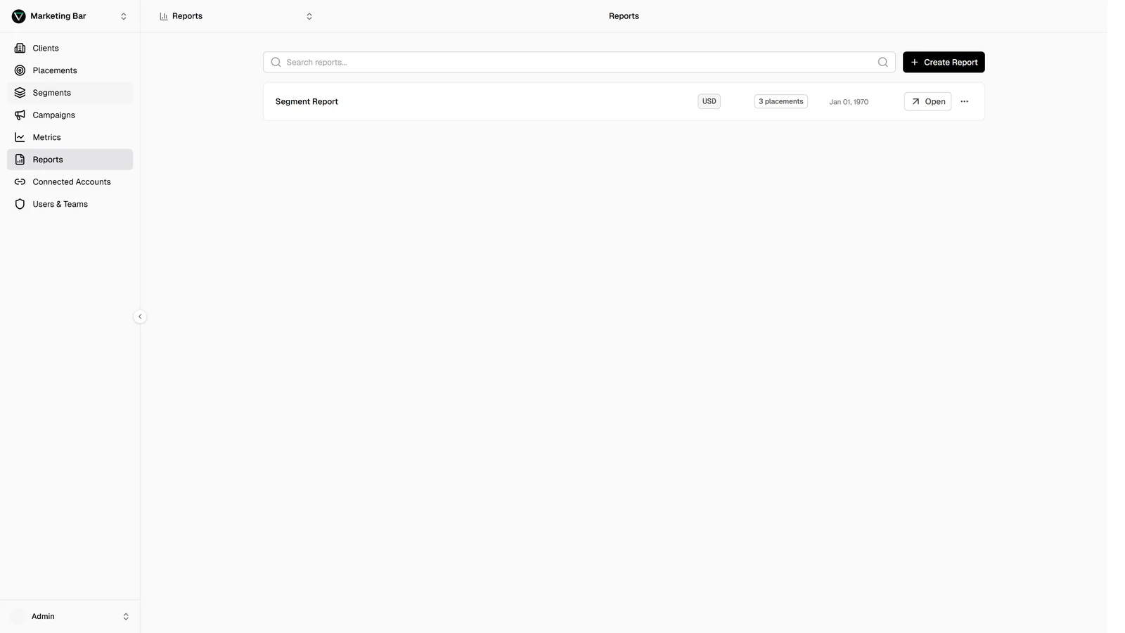 Reports page listing saved reports with name, currency, placement count, and updated date