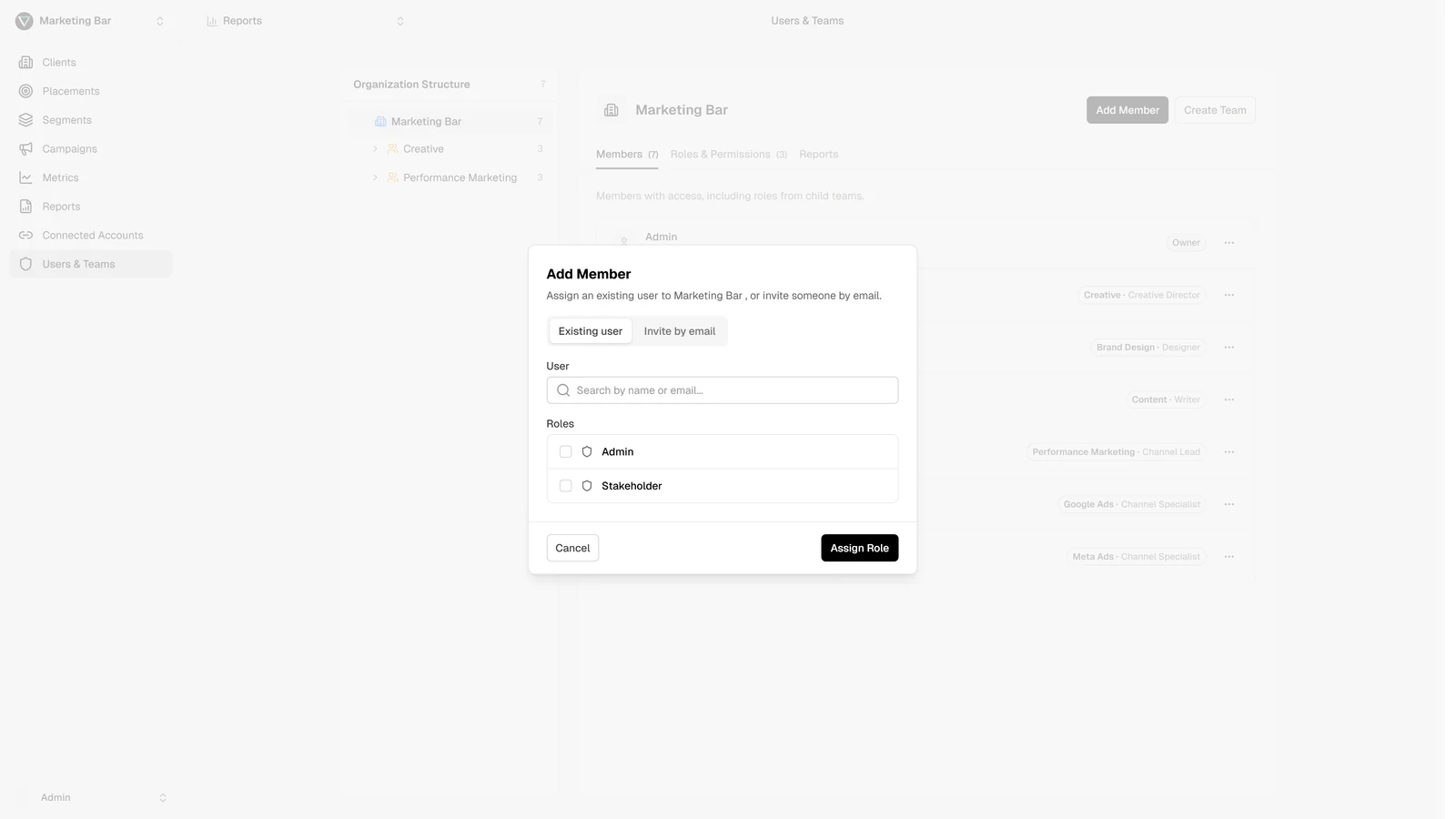 Add Member modal with two modes — Existing user and Invite by email — and a role-picker below
